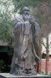 The Wen Miao (Confucian Temple) was constructed during the Ming Dynasty (1368 - 1644) and first used in 1439.<br/><br/>

Wuwei has a population of around 500,000, mainly Han Chinese, but with visible numbers of Hui as well as Mongols and Tibetans. In earlier times it was called Liangzhou. Dominating the eastern end of the Hexi Corridor, it has long played a significant role on this major trade route.<br/><br/>

Wuwei’s most famous historic artefact, the celebrated Han Dynasty (206 BCE - 220 CE) bronze horse known as the Flying Horse of Gansu, was discovered here in a tomb beneath Leitai Temple (Leitai Si) in the north part of town. Although the original is now on display in the Gansu Provincial Museum at Lanzhou, the horse’s likeness – depicted at an elegant, flying gallop, with one hoof briefly resting on the head of a flying swallow – is everywhere to be seen, most notably at the centre of Wuwei’s downtown Wenhua Square.